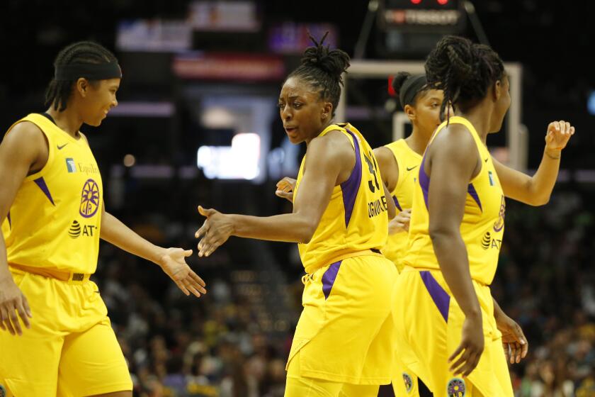 LOS ANGELES, CALIFORNIA - AUGUST 04: Tierra Ruffin-Pratt #10 and Nneka Ogwumike #30 of the Los Angeles Sparks high-five between plays during the second half of a game against the Seattle Storm at Staples Center on August 04, 2019 in Los Angeles, California. NOTE TO USER: User expressly acknowledges and agrees that, by downloading and or using this photograph, User is consenting to the terms and conditions of the Getty Images License Agreement. (Photo by Katharine Lotze/Getty Images)
