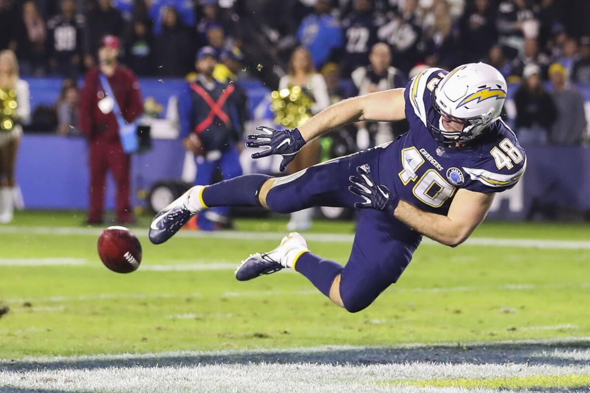 Los Angeles Chargers linebacker Nick Dzubnar makes a diving play to keep a punt out of the end zone during the NFL game between the Baltimore Ravens and Los Angeles Chargers at the StubHub Center in Carson, California, USA 22 December 2018.