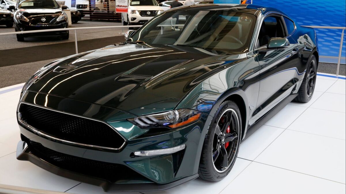 A 2019 Ford Mustang Bullitt on display at the Pittsburgh Auto Show in February. As Ford exits the sedan business, the Mustang is one model that it is keeping.