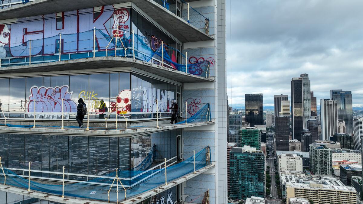 Taggers have graffitied more than 25 stories of a downtown Los Angeles skyscraper, the Oceanwide Plaza.