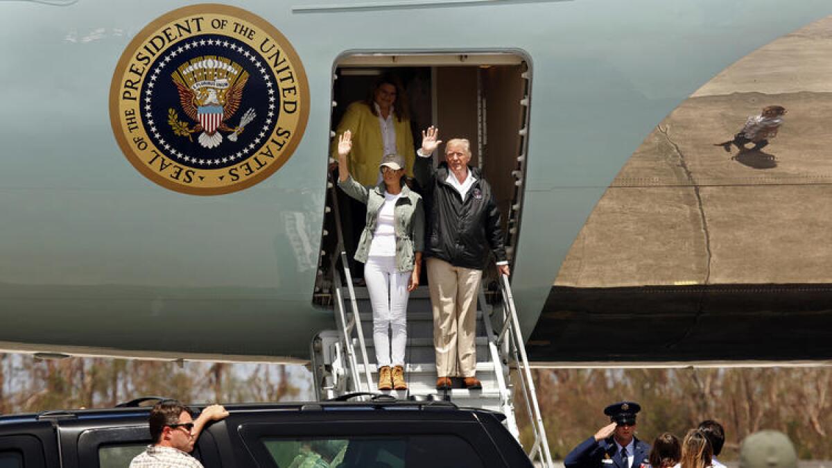 President Trump and First Lady Melania Trump arrive in Puerto Rico last week.