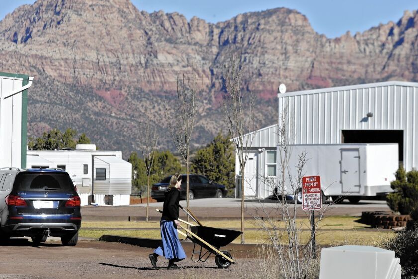 Hildale, Utah, pictured, and Colorado City, Ariz., are border towns long overseen by a polygamist sect. A jury decision may change that.