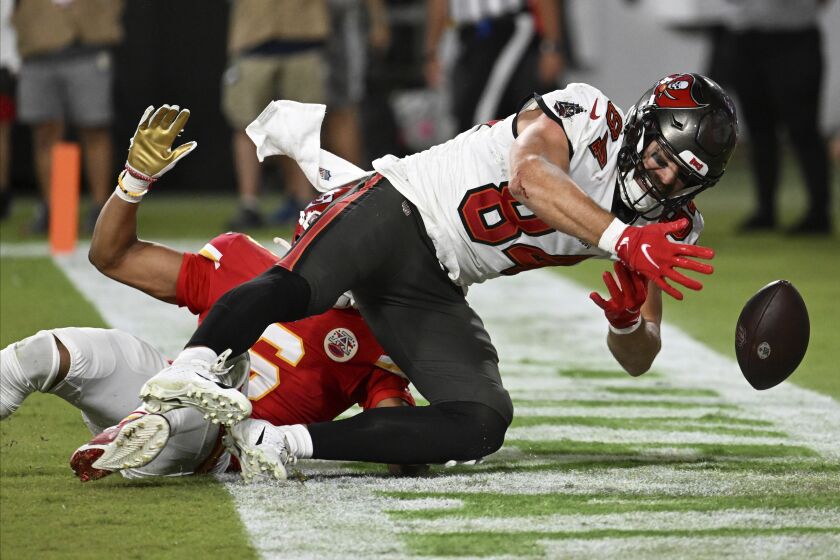 Tampa Bay Buccaneers tight end Cameron Brate (84) misses a catch during the first half of an NFL football game against the Kansas City Chiefs Sunday, Oct. 2, 2022, in Tampa, Fla. (AP Photo/Jason Behnken)