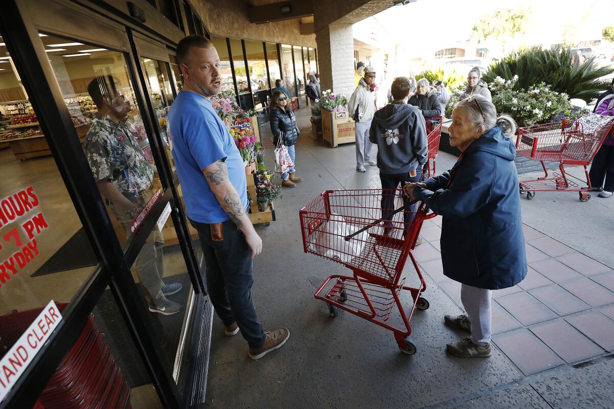 Some came early to Trader Joe's in Monrovia in hope of early shopping for seniors.