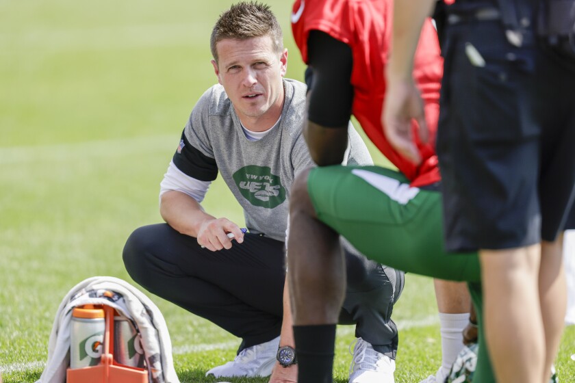 FILE - New York Jets offensive coordinator Mike LaFleur looks on during a joint NFL football training camp practice with the Green Bay Packers, Aug. 18, 2021, in Green Bay, Wis. After a season of trial and error with a rookie quarterback at the forefront, the Jets intend to firmly establish their identity on offense — with LaFleur leading the way. (AP Photo/Matt Ludtke, File)