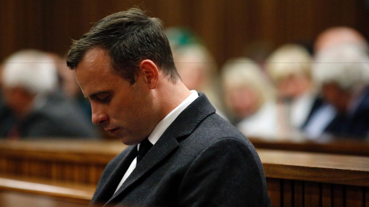 Oscar Pistorius listens during the sentencing hearing in his murder trial at the High Court in Pretoria on July 6.