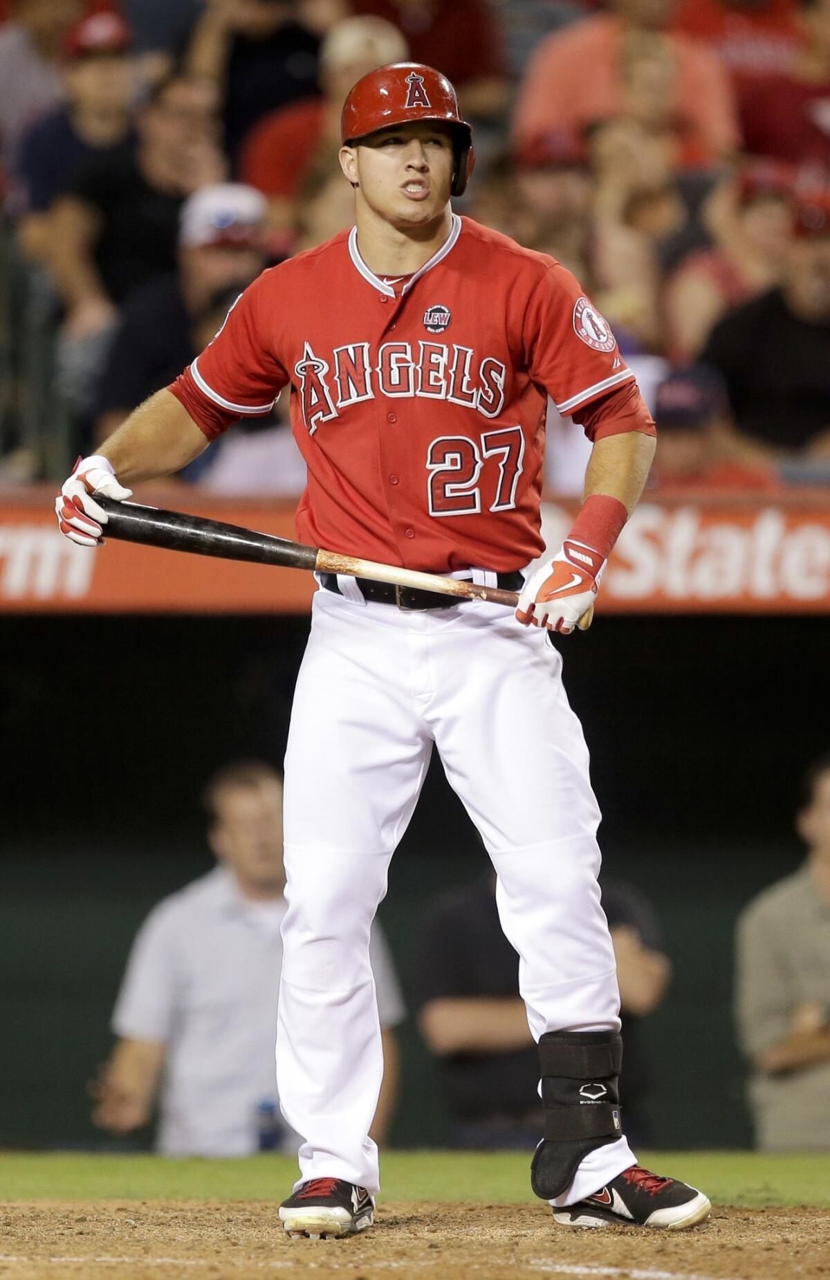 Angels left fielder Mike Trout reacts after striking out during the fifth inning of the Angels' 10-5 loss to the Oakland Athletics.