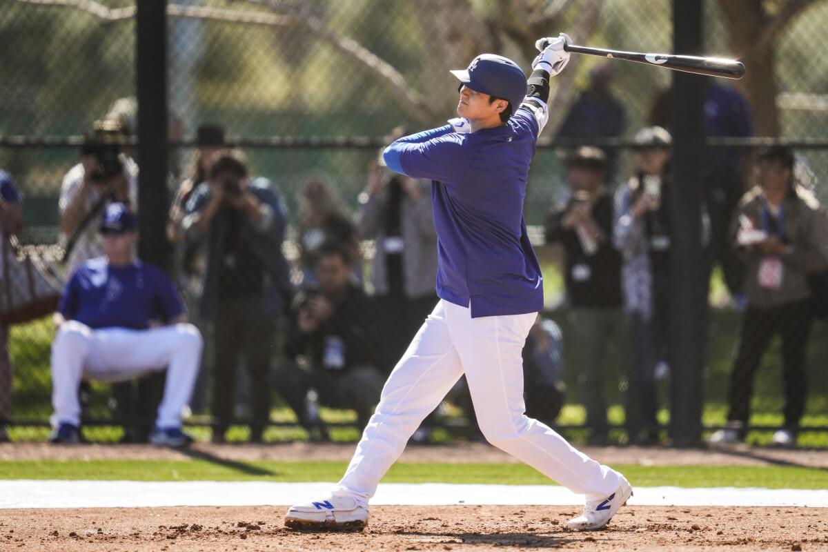 Dodgers star Shohei Ohtani swings during live batting practice at Camelback Ranch in Arizona on Monday.
