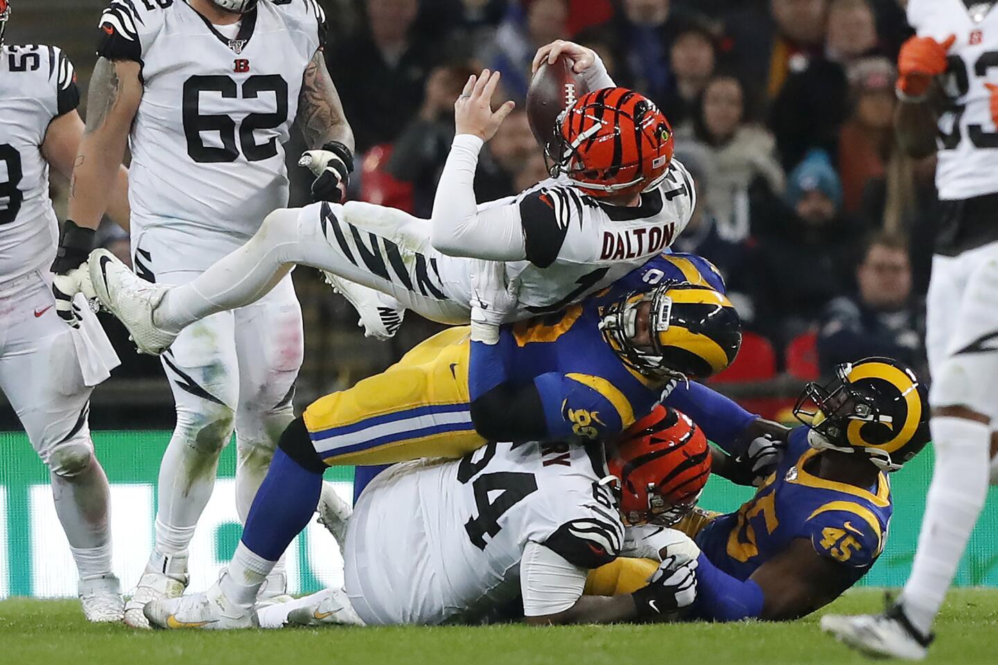 Bengals quarterback Andy Dalton is sacked by Rams defensive tackle Aaron Donald during the second half.