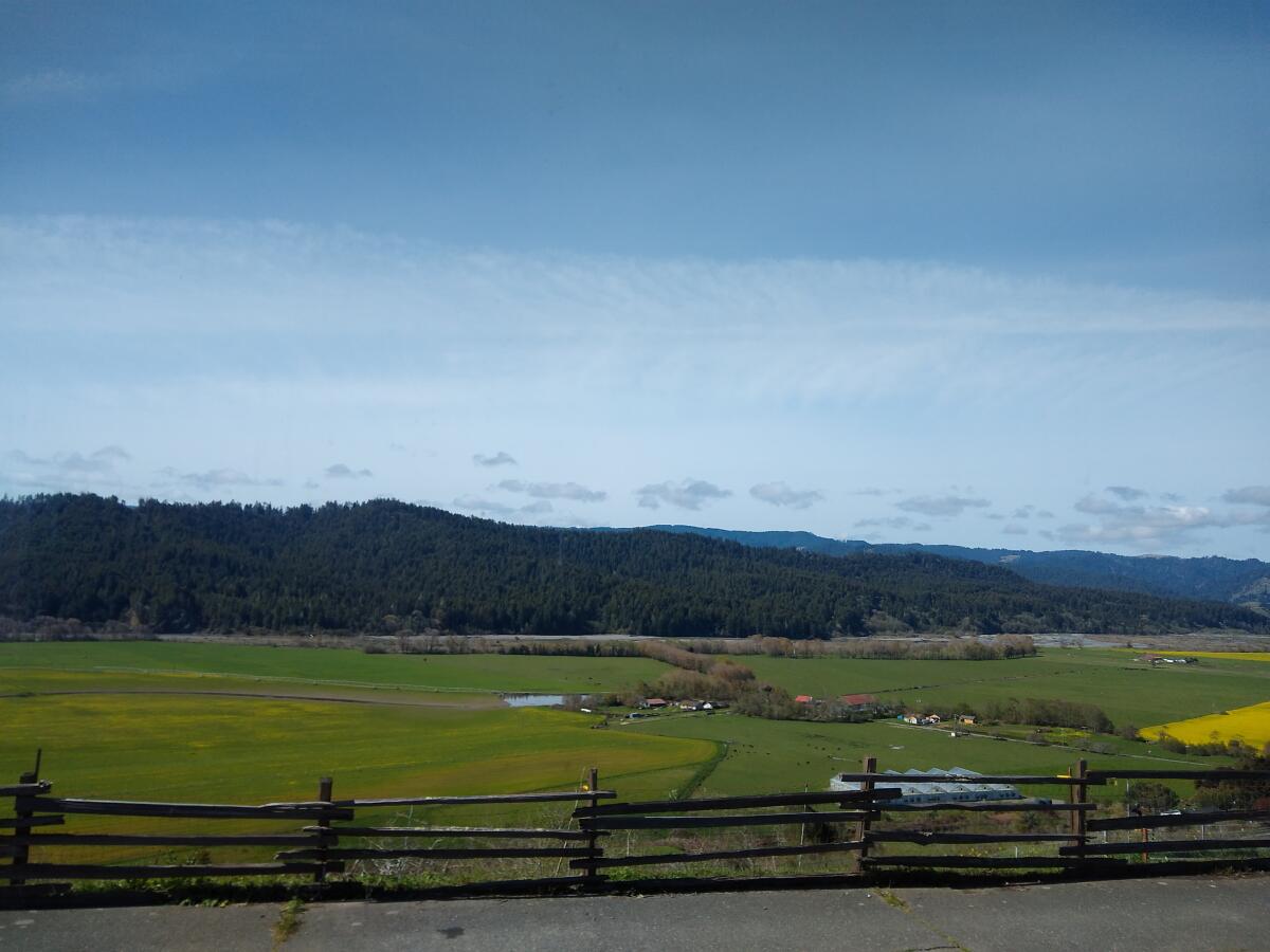 A view of farmland, forest and the Van Dusen River in Hydesville, Calif.