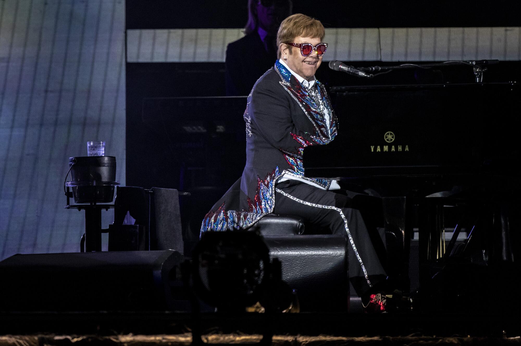 Elton John performs in concert