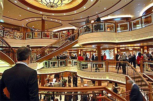 With a staircase like this, you can't help but make a splashy entrance in the three-deck Grand Lobby. With most of the Victoria's bars and lounges clustered on Deck 2 around the Grand Lobby, it's the hub of the ship.