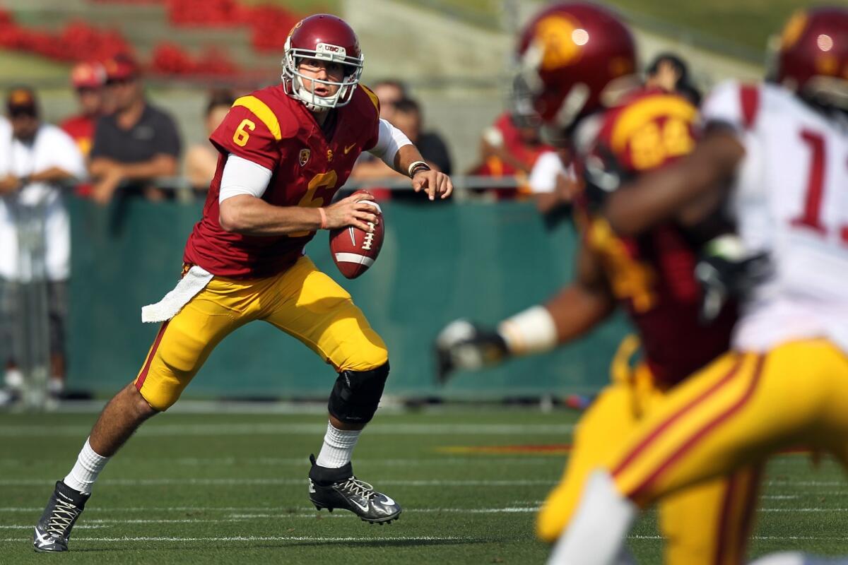 USC quarterback Cody Kessler looks downfield for an open receiver during the Trojans' spring game on April 19.