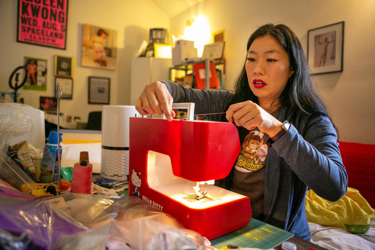  Kristina Wong on her sewing machine