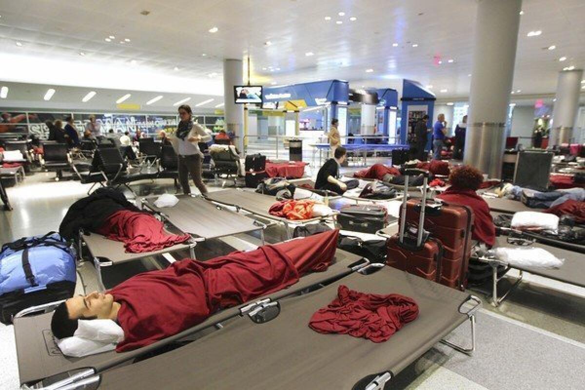 Passengers stranded by Superstorm Sandy at New York's John F. Kennedy International Airport on Oct. 31.