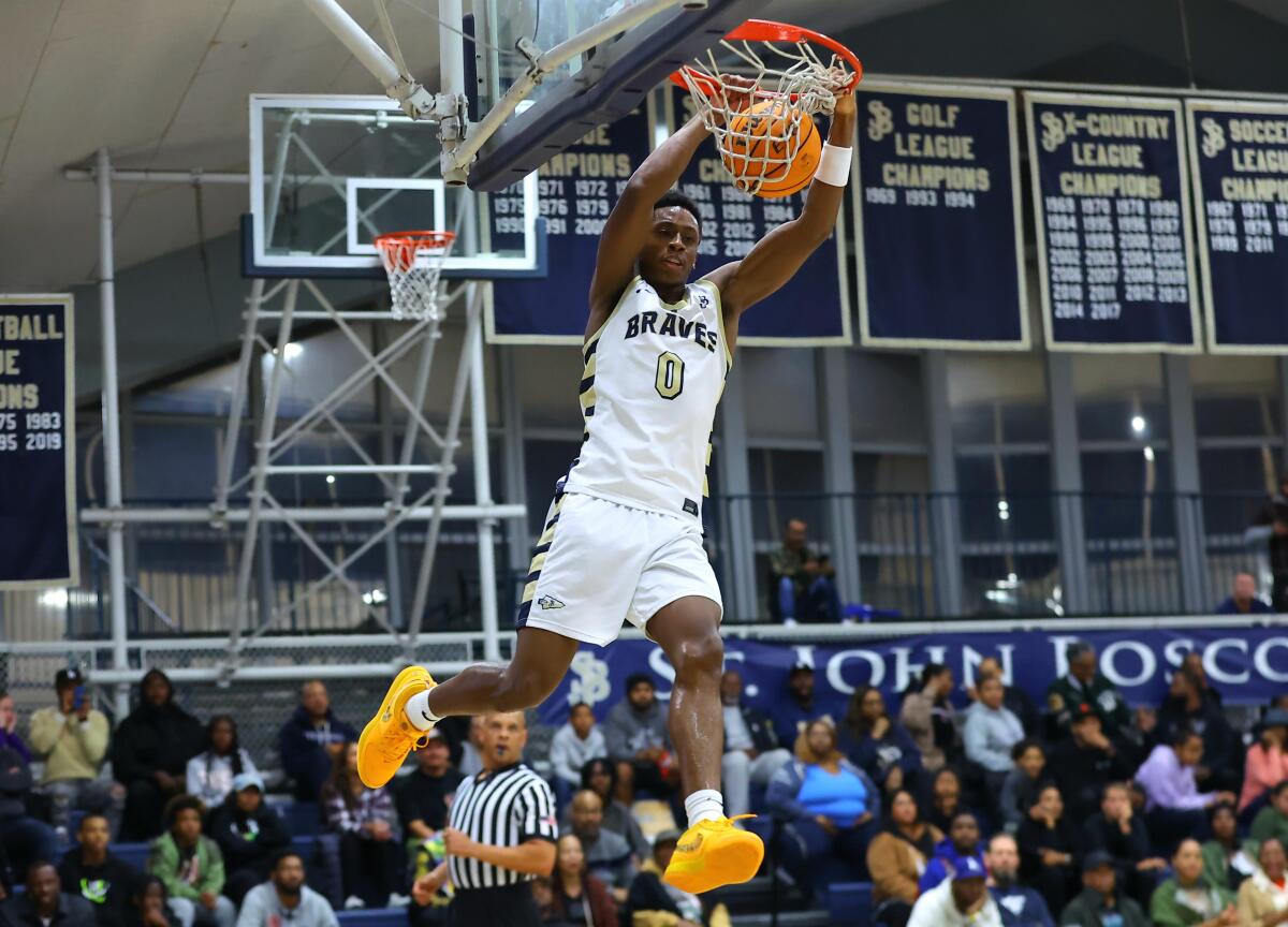 Brandon McCoy of St. John Bosco High throws down a two-handed dunk.