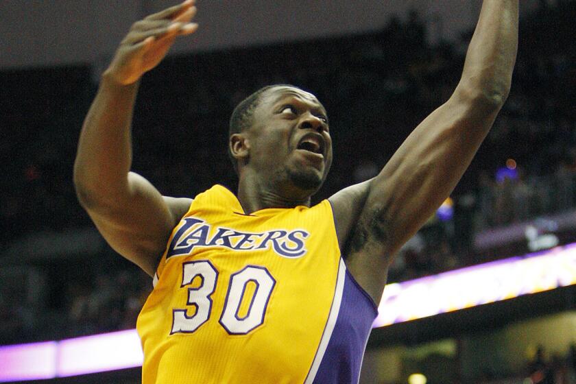 Lakers forward Julius Randle puts up a shot during an exhibition game against the Phoenix Suns on Oct. 21.