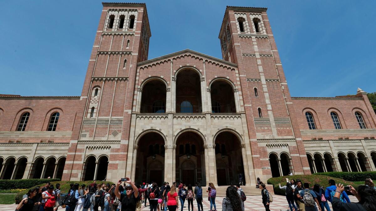 Carmine Marino, the finance director at UCLA, is accused of taking $81,000 from his former employer, City University of New York.