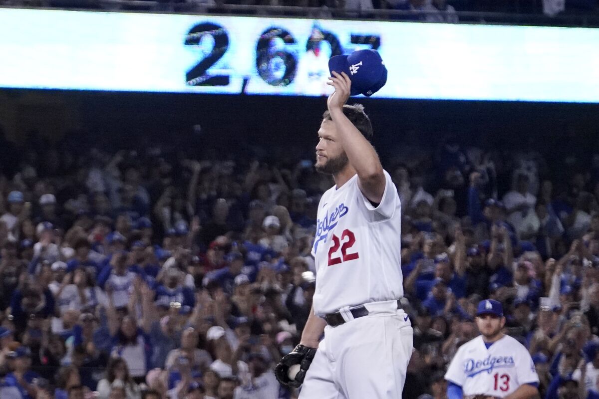 Dodgers pitcher Clayton Kershaw acknowledges the crowd after striking out Detroit's Spencer Torkelson.