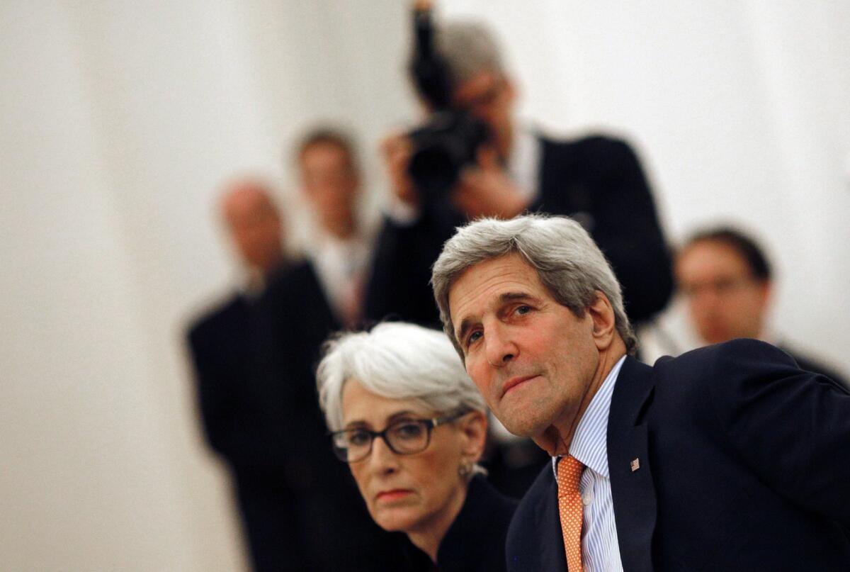 U.S. Secretary of State John F. Kerry and Undersecretary of State Wendy Sherman meet with foreign ministers at a hotel in Vienna on Tuesday to discuss Iran's nuclear program.