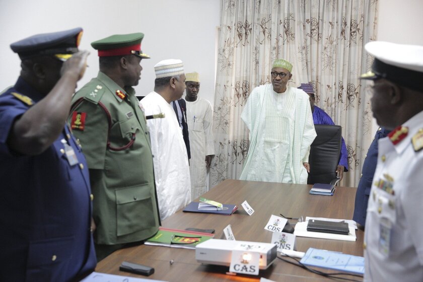 Nigerian President Muhammadu Buhari meets with military chiefs in Abuja on June 2, 2015.