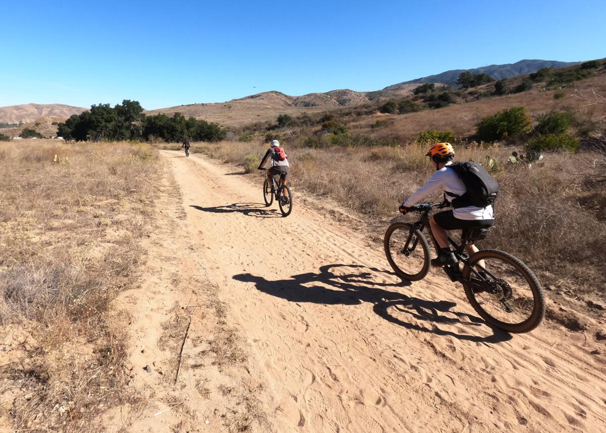 Mountain bikers pedal through Gypsum Canyon Wilderness on Tuesday.