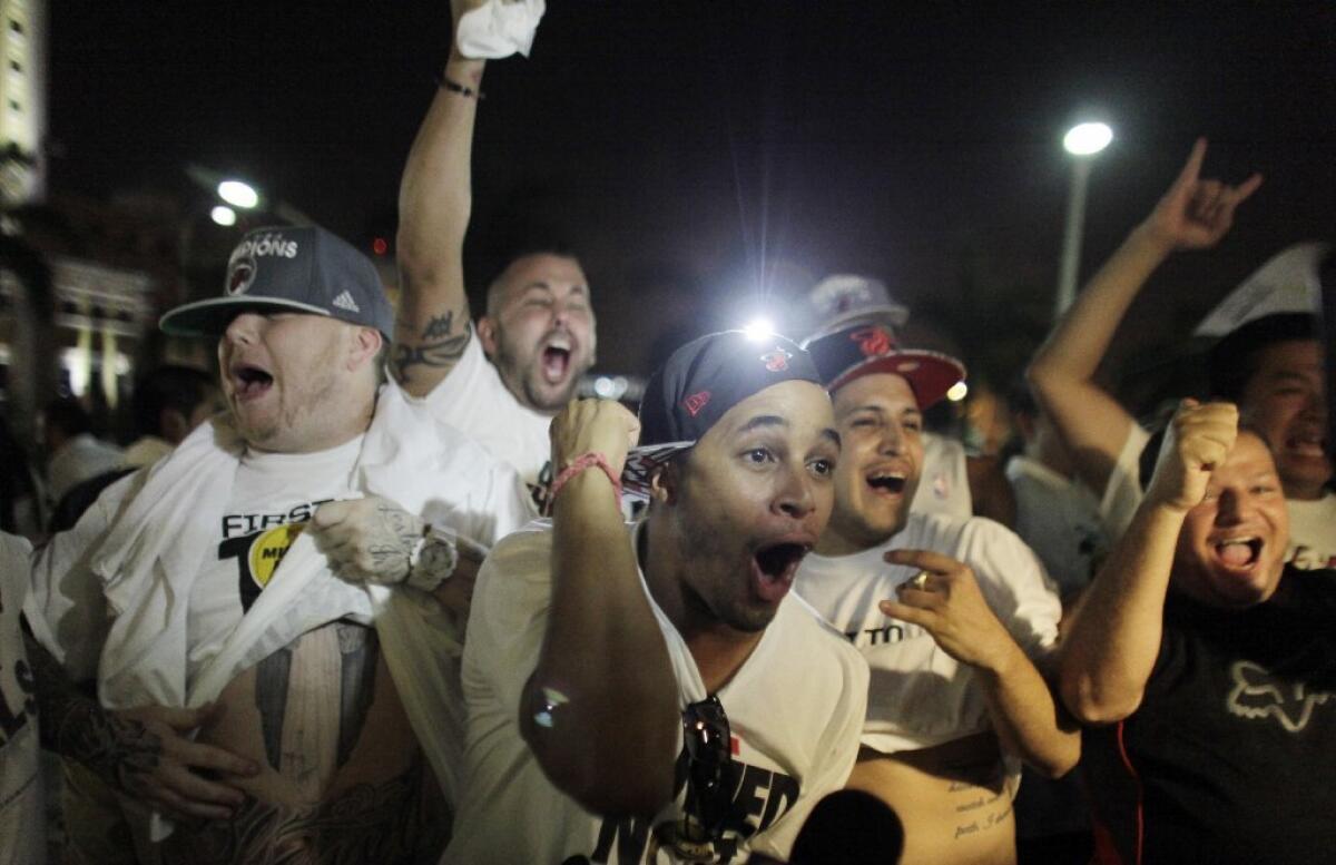 Heat fans gather outside the arena to celebrate Miami's Game 6 victory.
