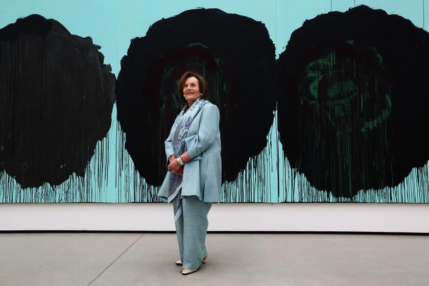Edye Broad at the Broad museum with a Cy Twombly painting titled "The Rose (V), 2008," part of her and her husband Eli's collection.