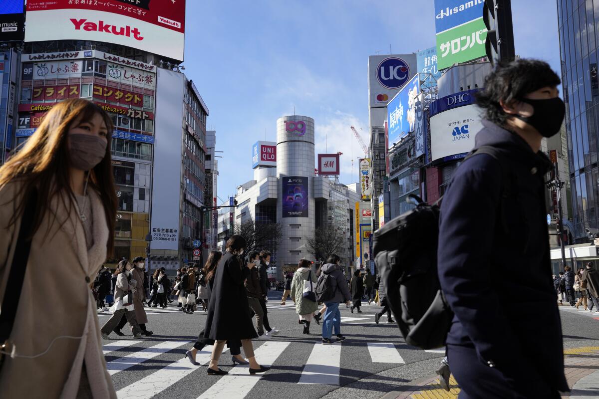 Pedestrians at an intersection in Tokyo