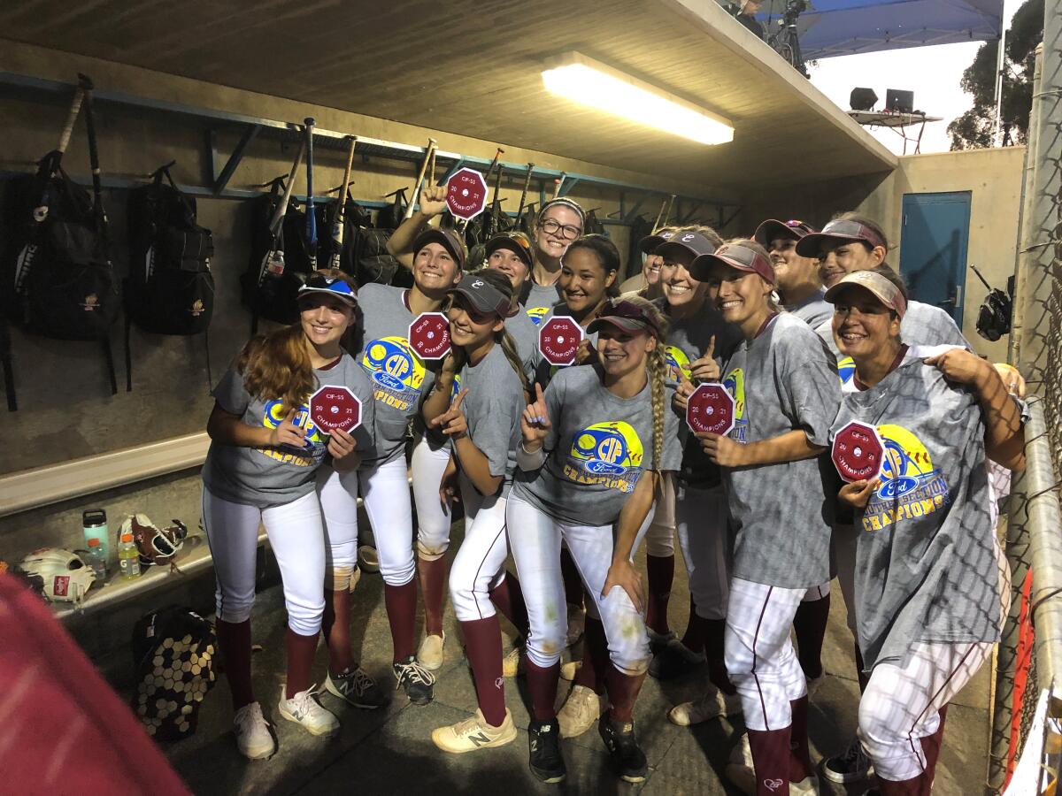 Esperanza High players pose for a photo after winning the Southern Section Division 1 softball title on June 18, 2021.