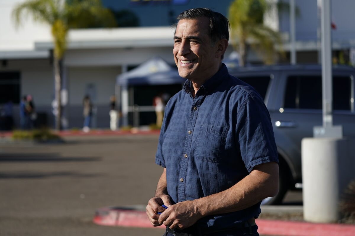 Congressional candidate and former Republican congressman Darrell Issa speaks during an interview Tuesday, Nov. 3, 2020, in San Marcos, Calif. Issa is running for Congress in California's 50th district. (AP Photo/Gregory Bull)