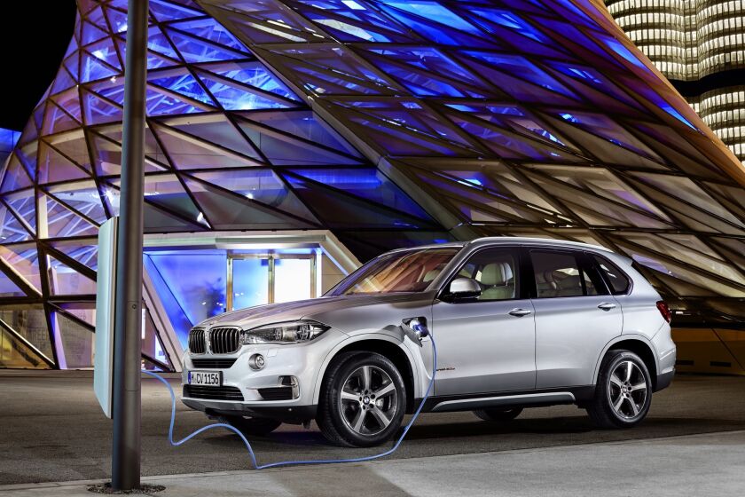 BMW's xDrive40e is a new plug-in hybrid version of its X5 SUV. It has 313 total horsepower from a turbocharged four-cylinder engine and an electric motor.