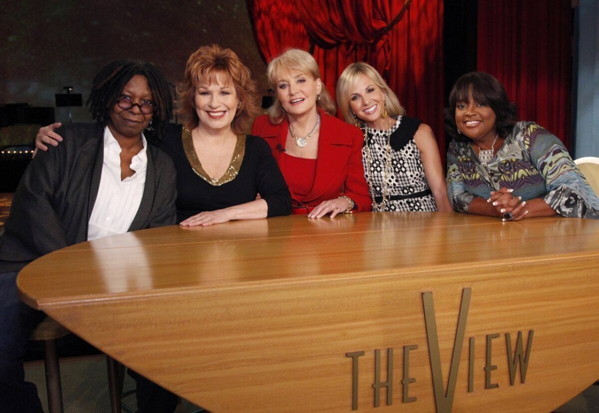 Whoopi Goldberg, Joy Behar, Barbara Walters, Elizabeth Hasselbeck and Sherri Shepherd pose on the set of the ABC daytime talk show "The View " as they launch their 14th season in New York. Behar is leaving the show at the end of the current season in August 2013.