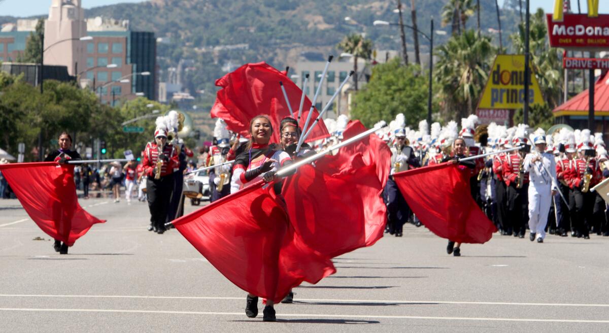 The Burbank-Burroughs All City band performs at the annual Burbank on Parade, on Olive Avenue on Saturday, April 23, 2016.