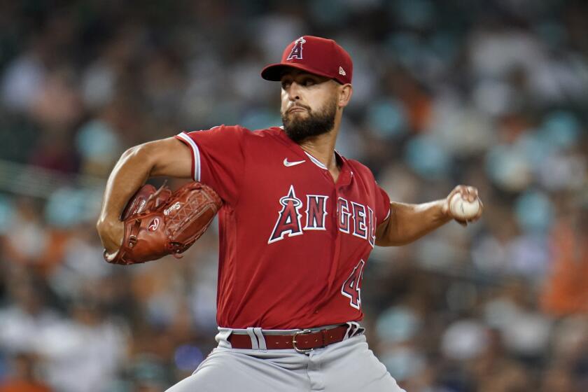 Angels left-hander Patrick Sandoval delivers against the Detroit Tigers in the seventh inning Aug. 19, 2022.