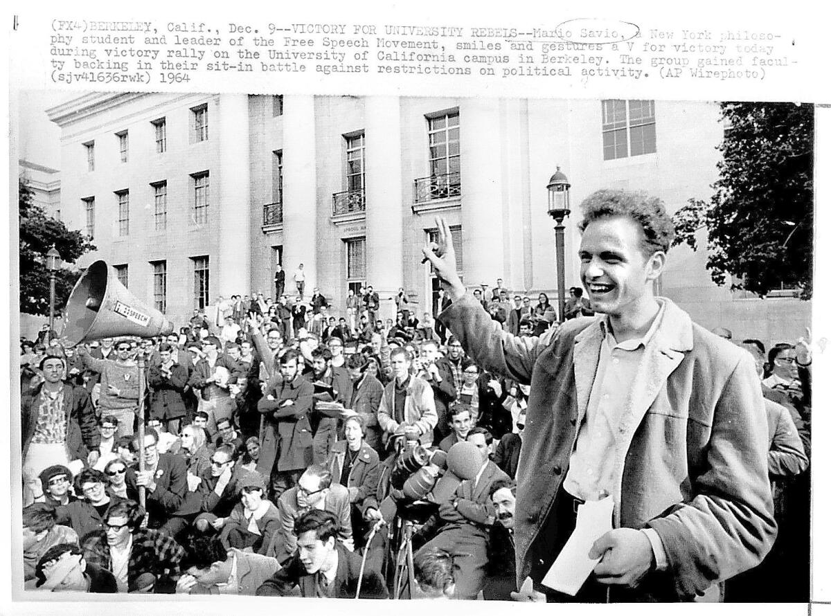 Mario Savio gestures during a 1964 Free Speech Movement rally at UC Berkeley. (Associated Press)