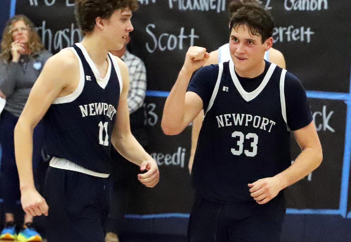 Jack Berry (11) and Cole Leinart (33) celebrate during the Battle of the Bay game.