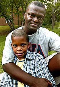 John Kanu, from Sierra Leone, is a doctor in training at the University of Virginia. His son's name is also John.