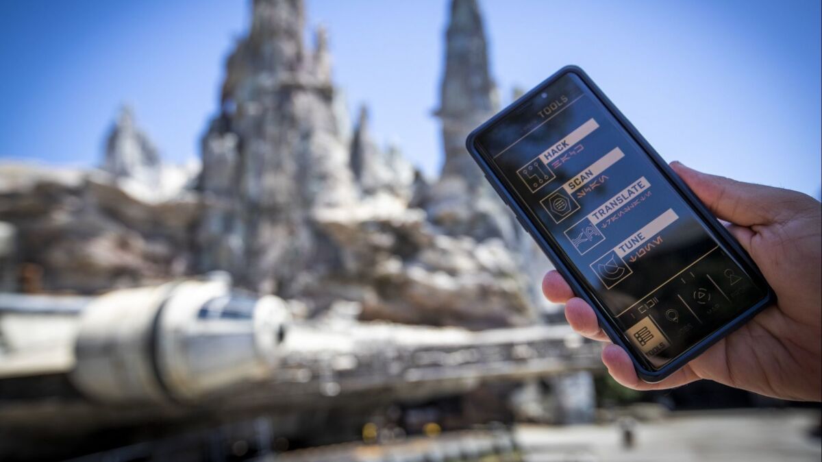 Star Wars: Galaxy's Edge becomes a walk-around video game to guests using the Datapad app.