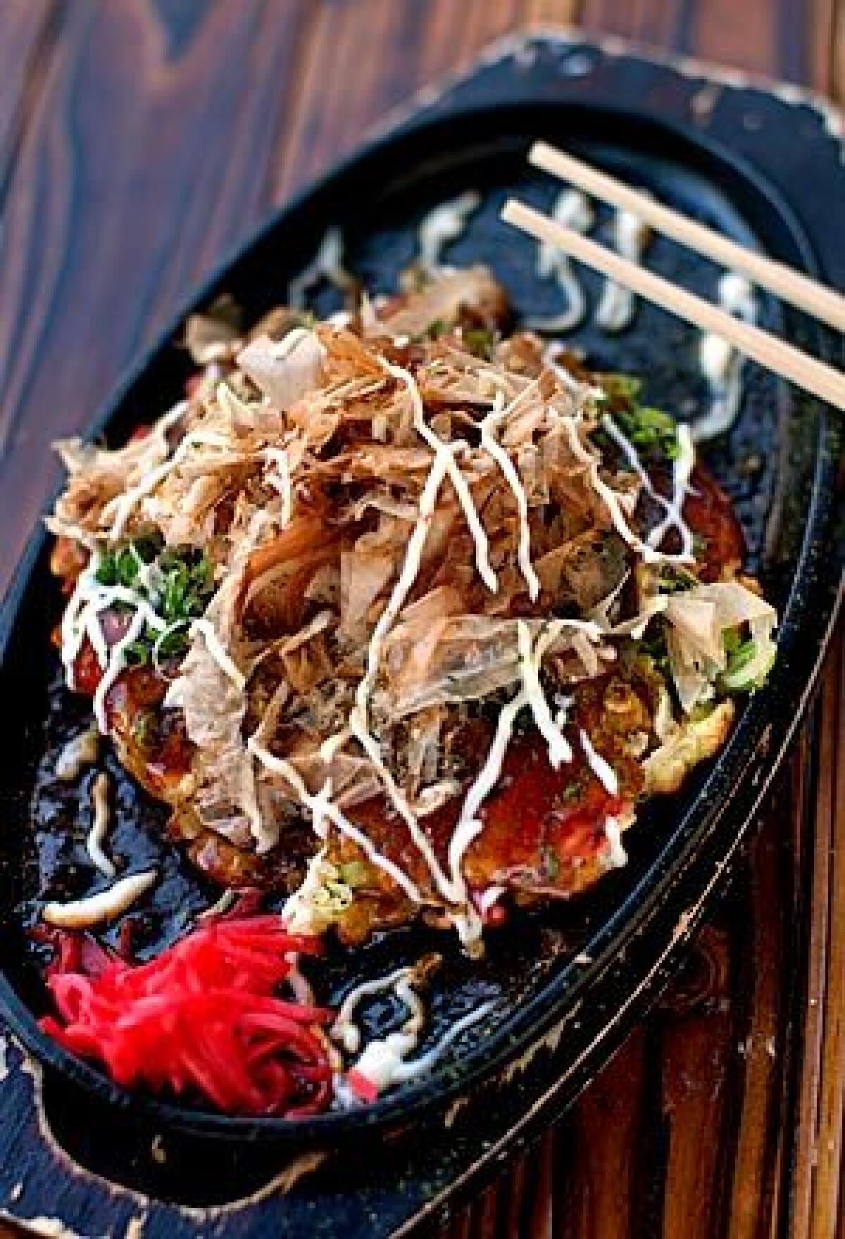 Okonomiyaki with shrimp, squid at Aburiya Toranoko.