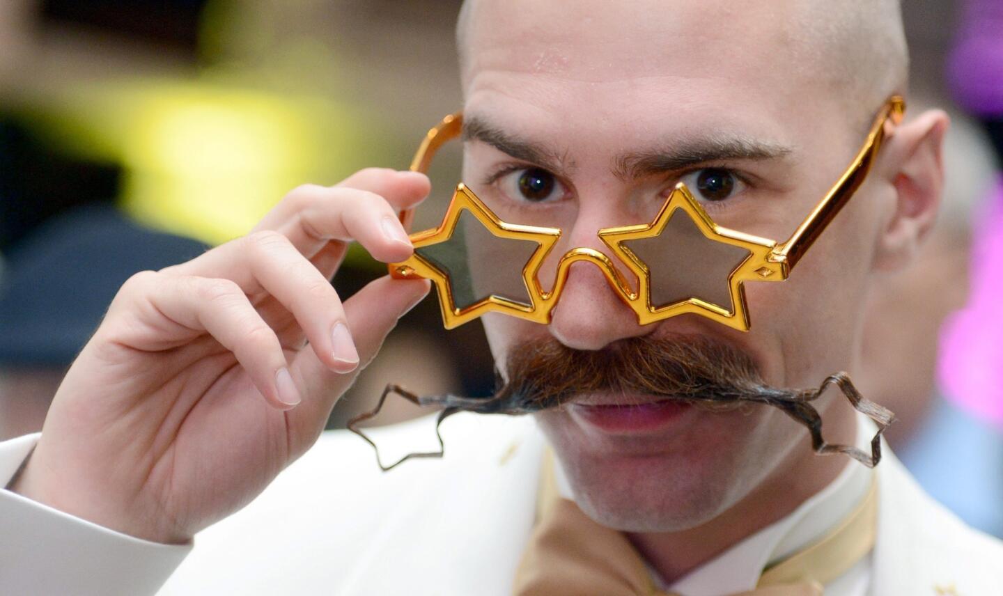 Dan Lawlor's star-shaped mustache tips -- and gold star sunglasses -- earned Lawlor first place for freestyle mustache.