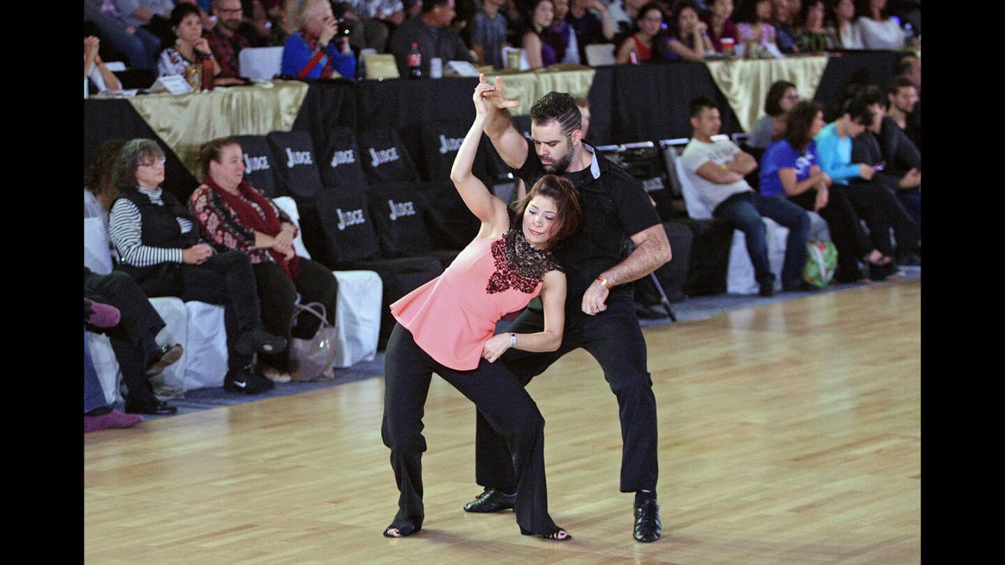Tashina Beckmann and PJ Turner compete at the U.S. Open Swing Championships, held at the Los Angeles Marriott Burbank Airport Hotel on Wednesday, November 25, 2015.