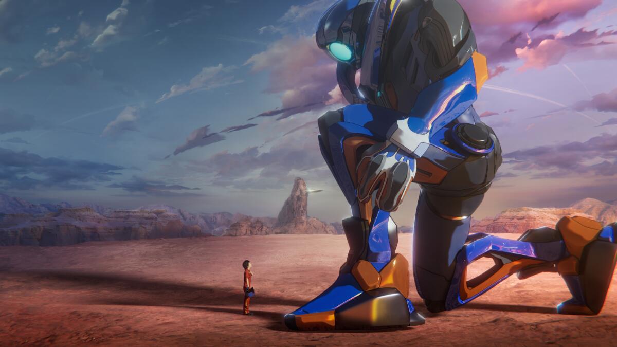 a teen looking up at a giant alien robot