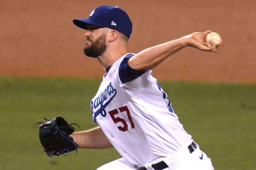 Alex Wood  pitches in relief during the eighth inning against the Arizona Diamondbacks 