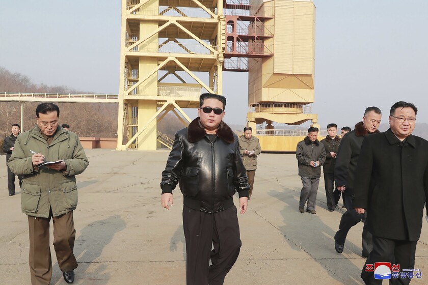 In this undated photo provided by the North Korean government on Friday, March 11, 2022, North Korean leader Kim Jong Un visits the Sohae Satellite Launching Ground in Tongchang-ri, North Korea. Independent journalists were not given access to cover the event depicted in this image distributed by the North Korean government. The content of this image is as provided and cannot be independently verified. Korean language watermark on image as provided by source reads: "KCNA" which is the abbreviation for Korean Central News Agency. (Korean Central News Agency/Korea News Service via AP)