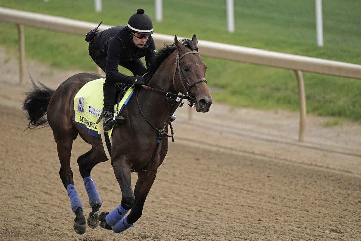 Kentucky Derby entrant Messier works out at Churchill Downs on Wednesday.