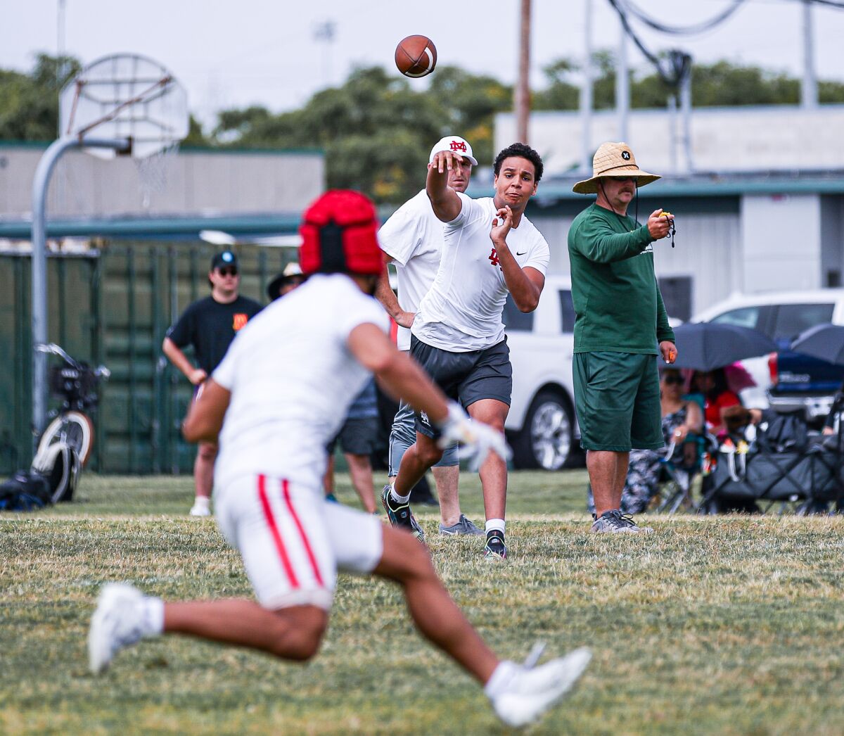 Stanford-bound quarterback Elijah Brown of Mater Dei fires a pass at Battle of the Beach passing tourney.