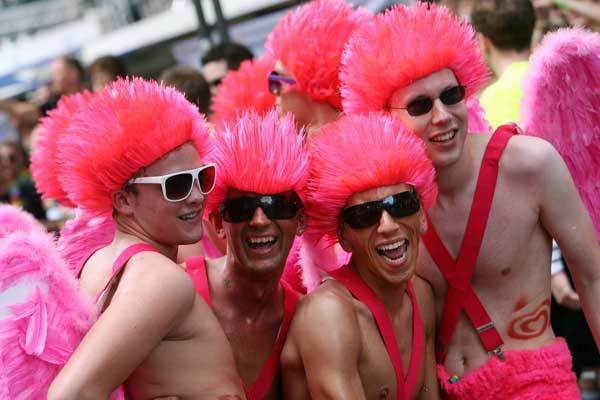 Participants of the Christopher Street Day (CSD) gay pride parade celebrate in Cologne, western Germany on July 4, 2010. Thousands of gays and lesbians marched through the streets of Cologne to demonstrate for equality and social acceptability.