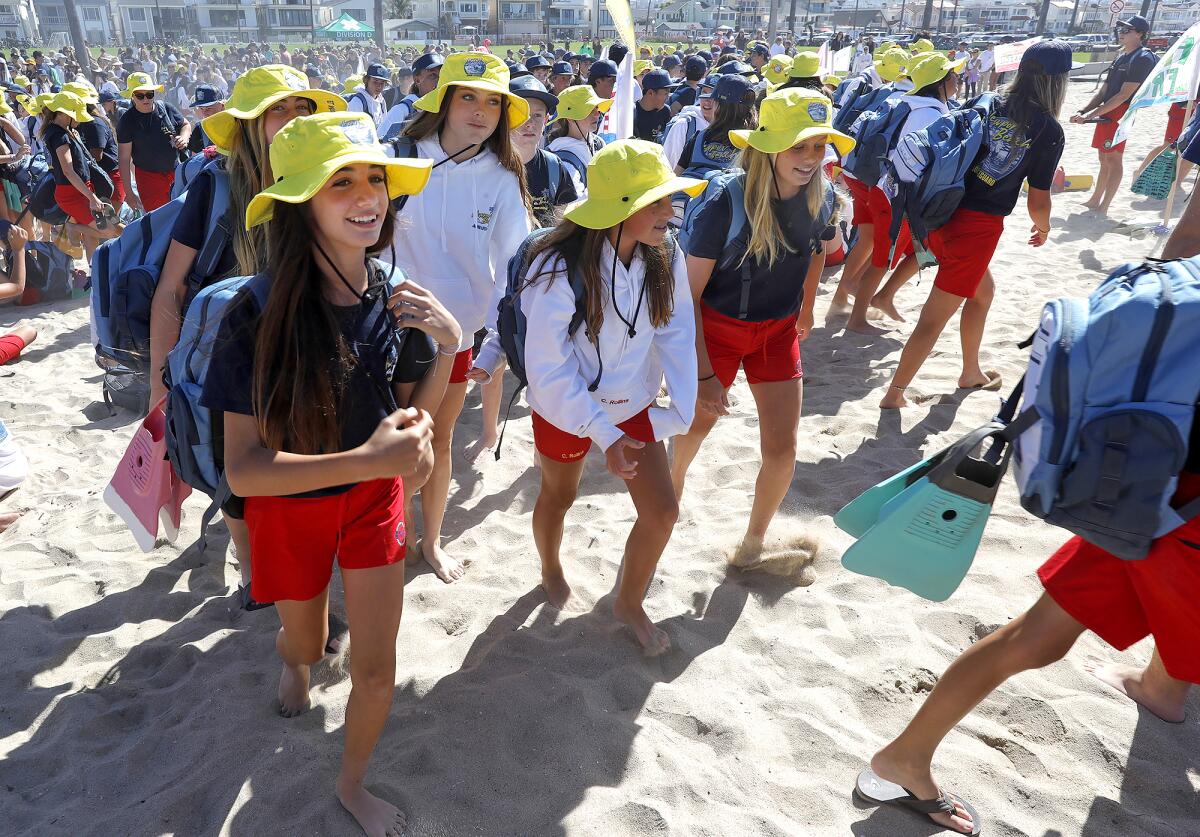 Junior lifeguards head off to their division tents.