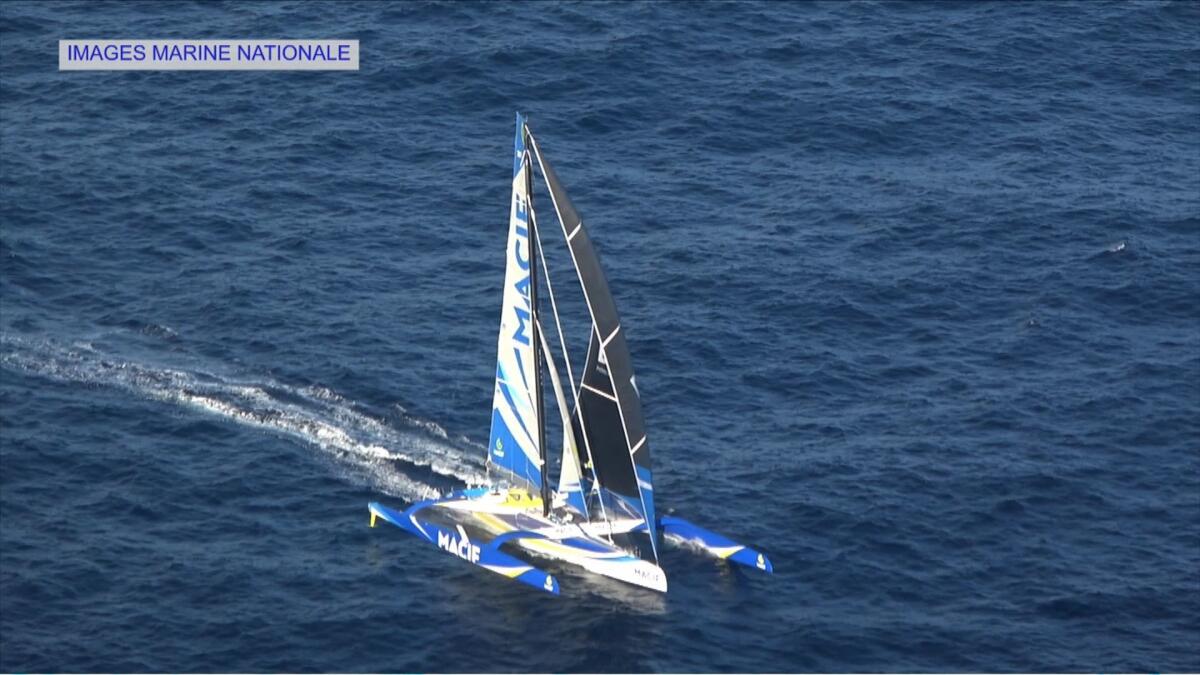 A screen shot taken Saturday from a French Marine Nationale video shows skipper Francois Gabart's Macif trimaran.